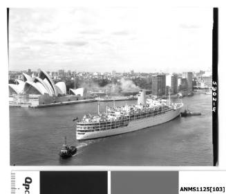 P&O liner IBERIA departing Circular Quay with a tug pushing the starboard bow, and another pulling the stern rope