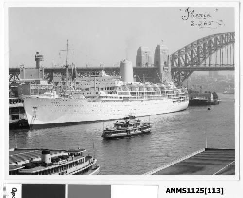 P&O liner IBERIA moored at Circular Quay with the twin-deck ferry KAMERUKA visible in the foreground