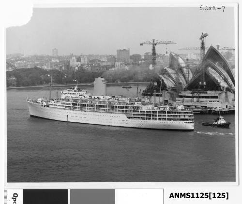 P&O liner IBERIA departing Sydney with the stern tow rope disconnected and the tug moving away