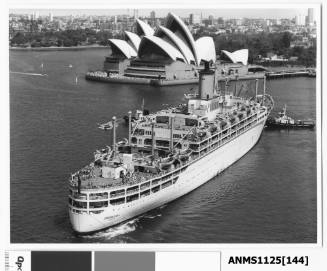 ORONSAY departing Sydney assisted by three tugs, one on the starboard bow, one pulling the bow rope, and the third (not shown) pulling the stern rope