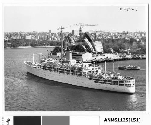 Departing P&O liner ORONSAY passing the Sydney Opera House which is still under construction