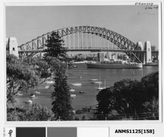 P&O liner ORONSAY passing under the Sydney Harbour Bridge with the small pleasure craft of Lavender Bay in the foreground