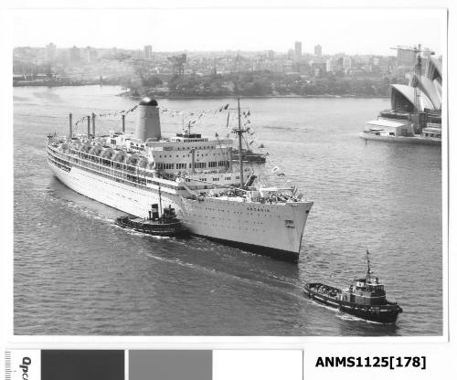 P&O liner ARCADIA dressed with flags and arriving in Sydney with the tugs WILLARA and WOONA assisting