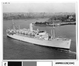 Upon arriving in Sydney the P&O liner STRATHEDEN passes Bennelong Point, the Fort Macquarie Tram Depot and Government House