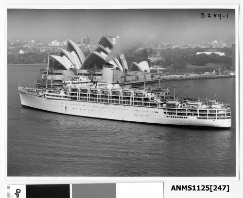 Outgoing P&O liner HIMALAYA passing Bennelong Point and the Sydney Opera House, with Government House immediately behind