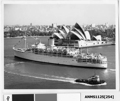 Outgoing P&O liner HIMALAYA passing the Sydney Opera House with a departing tugboat seen in the lower right corner of the image