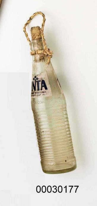 Fanta bottle containing holy water from the village of Lamalera