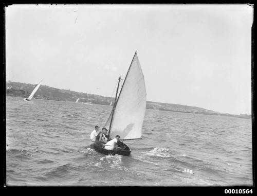 Small open boat sailing on Sydney Harbour