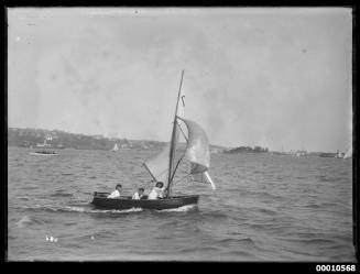 Small skiff sailing on Sydney Harbour