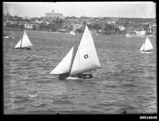Skiff and dingy sailing near Manly on Sydney Harbour