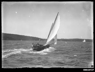 Large open boat sailing near Georges Heights, Sydney Harbour