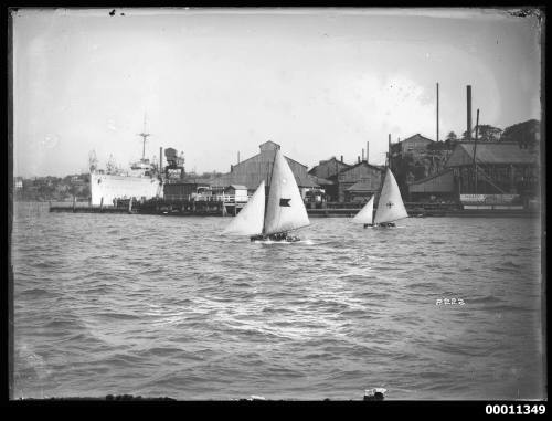 HMAS ALBATROSS and 16-foot skiffs at Cockatoo Island, Sydney Harbour