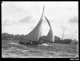 Large half-decked sloop on Sydney Harbour