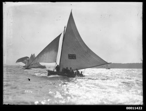 18-footer AUSTRALIA with the fleet on Sydney Harbour