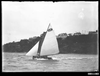 Small skiff sailing on Sydney Harbour