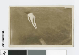 A woman diving off a diving board, presumably Beatrice Kerr