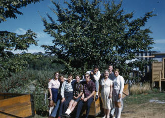 Ilsa Konrads and group of people at an orchard