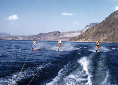 Water skiing viewed from the boat's bow