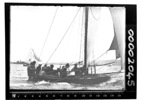 Close-up of 18-footer sailing on Sydney Harbour