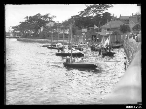 Sloops preparing for a race on Sydney Harbour, inscribed 2729