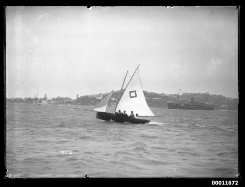 18-foot skiff crew struggling to upright boat on Sydney Harbour even under reduced rig