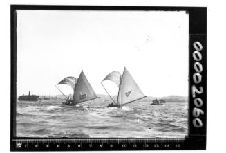 Two 18-footers on Sydney Harbour, N.S.W. and GLORIA.