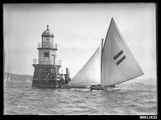 18-foot skiff HC PRESS rounds Wedding Cake Channel Marker near Watson's Bay with lee cloth in place for heavy weather Number 246 left bottom corner