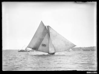 18-foot skiff AUSTRALIA carrying all sails including ring-tail outside union jack insignia