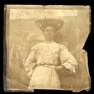 Photograph of Beatrice Kerr wearing a white dress