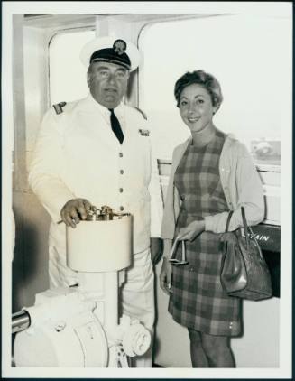 Public relations 54.  Miss Beverley Robinson of Perth, Pictured on the bridge of the P&O liner, "Iberia", with captain W B Vickers. date unknown.