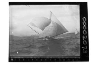 18-footer with masthead spinnaker and balloon jib sailing on Sydney Harbour