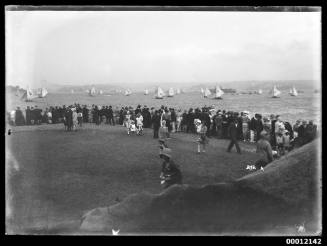 Spectators watching a race from Clark Island, inscribed 3172 A