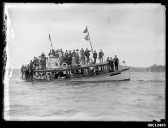 Spectators on a ferry near Clark Island, Sydney Harbour