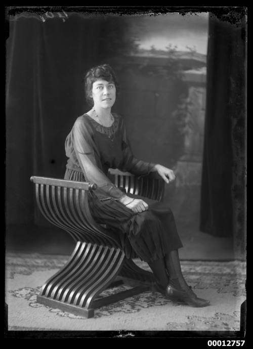 Portrait of a woman seated on chair