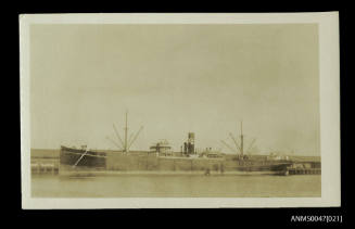 SS QUEENMORE of the Runciman, Walter & Co Line docked at a wharf