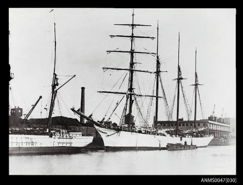 Barquentine TACORA docked a coal wharf