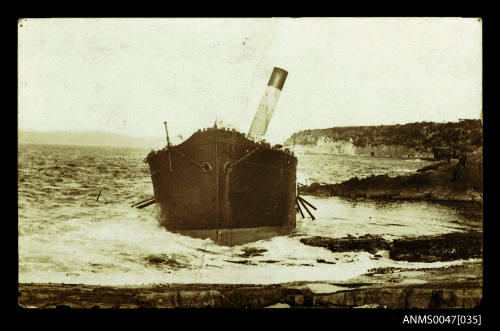 Steamship run aground on rocks