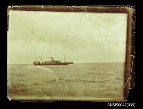 Damaged passenger liner underway at sea