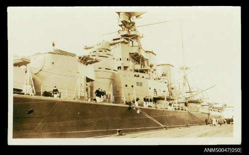 HMS HOOD docked at a wharf on its visit to Australia in 1924