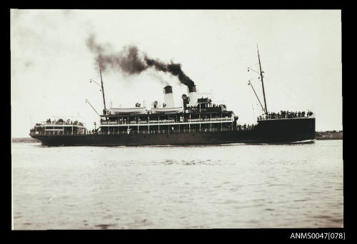 Crowded ferry underway on a harbour