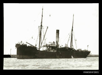 SS PUKAKI anchored in a port