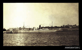 SS PORT CAROLINE docked at a wharf