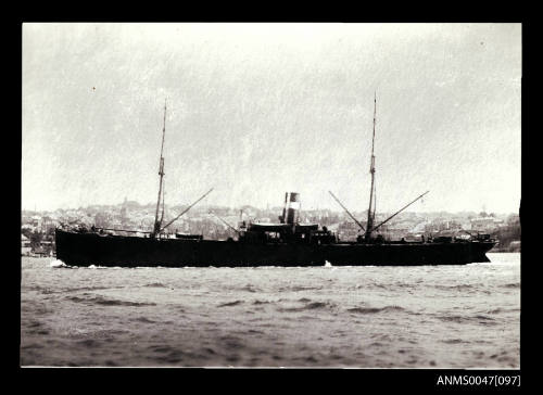 SS EOSLY underway in a harbour