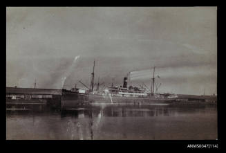 SS HYMETTUS docked at a wharf