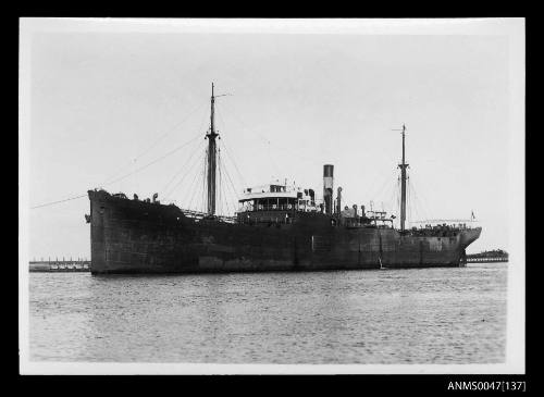 SS KOOLONGA being towed in a harbour