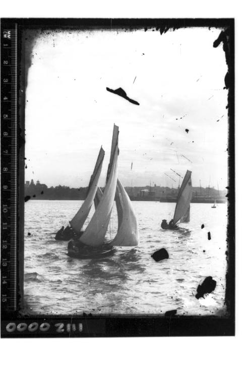 Open boats sailing on Sydney Harbour