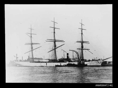 Full-rigged ship SOPHIE docked at a wharf