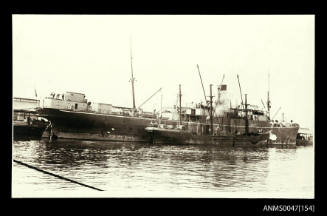 SS CARPENTARIA with a coal barge alongside