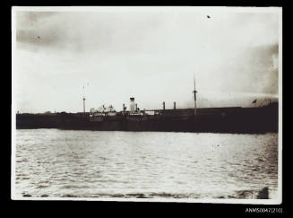 SS POLLENZO anchored at a dock