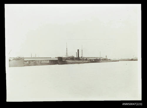 SS KOMURA docked at a wharf